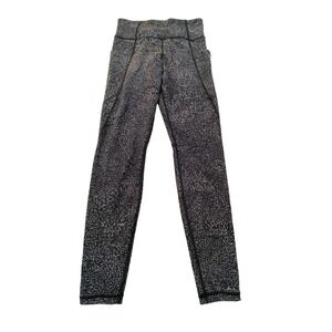 Athleta Salutation Stash Pocket Tight Black White‎ Dash Print Leggings Womens S